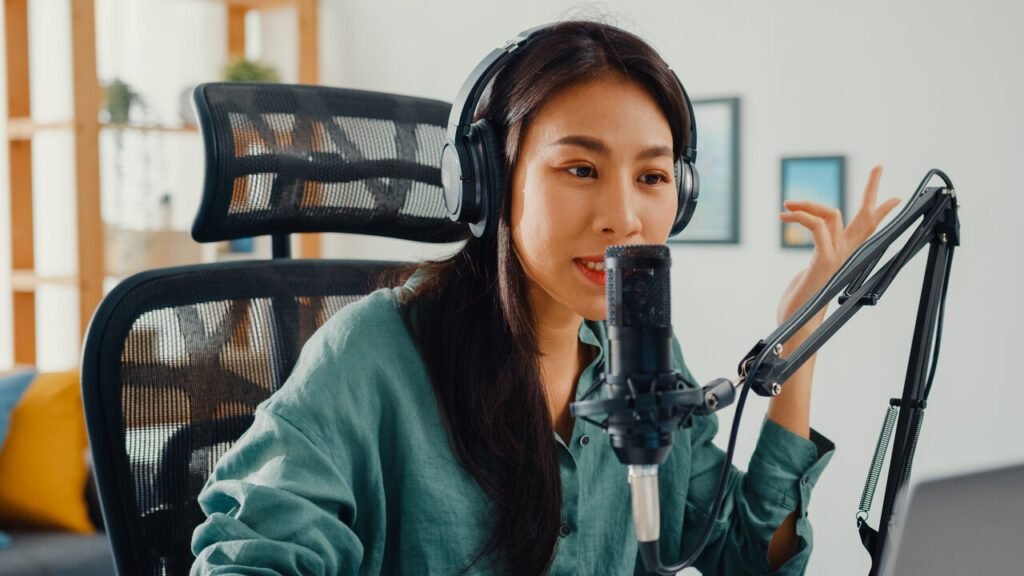 asian lady recording podcast as influencer marketing